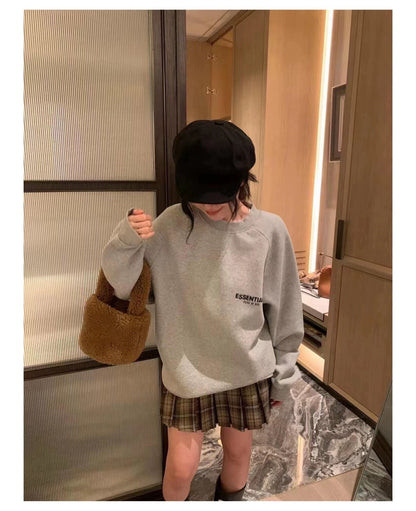 AMBERELLE Back Logo Long Sleeve Sweatshirt in cream