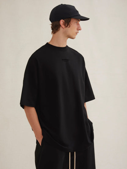 AMBERELLE Cloud Soft Minimal Logo Short Sleeve Tee in light heather grey