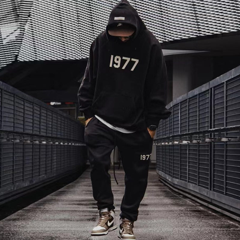 AMBERELLE 1977 Graphic Fleece Hoodie in black
