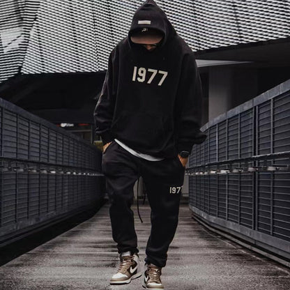AMBERELLE 1977 Graphic Fleece Hoodie in black