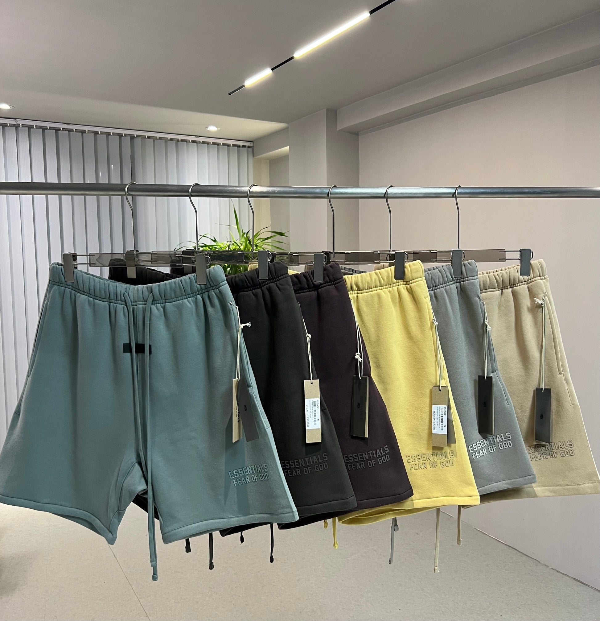 AMBERELLE Silicone Logo Fleece Sweatshorts in dark taupe