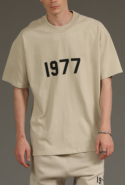 AMBERELLE 1977 Graphic Oversized Short Sleeve T-Shirt in beige