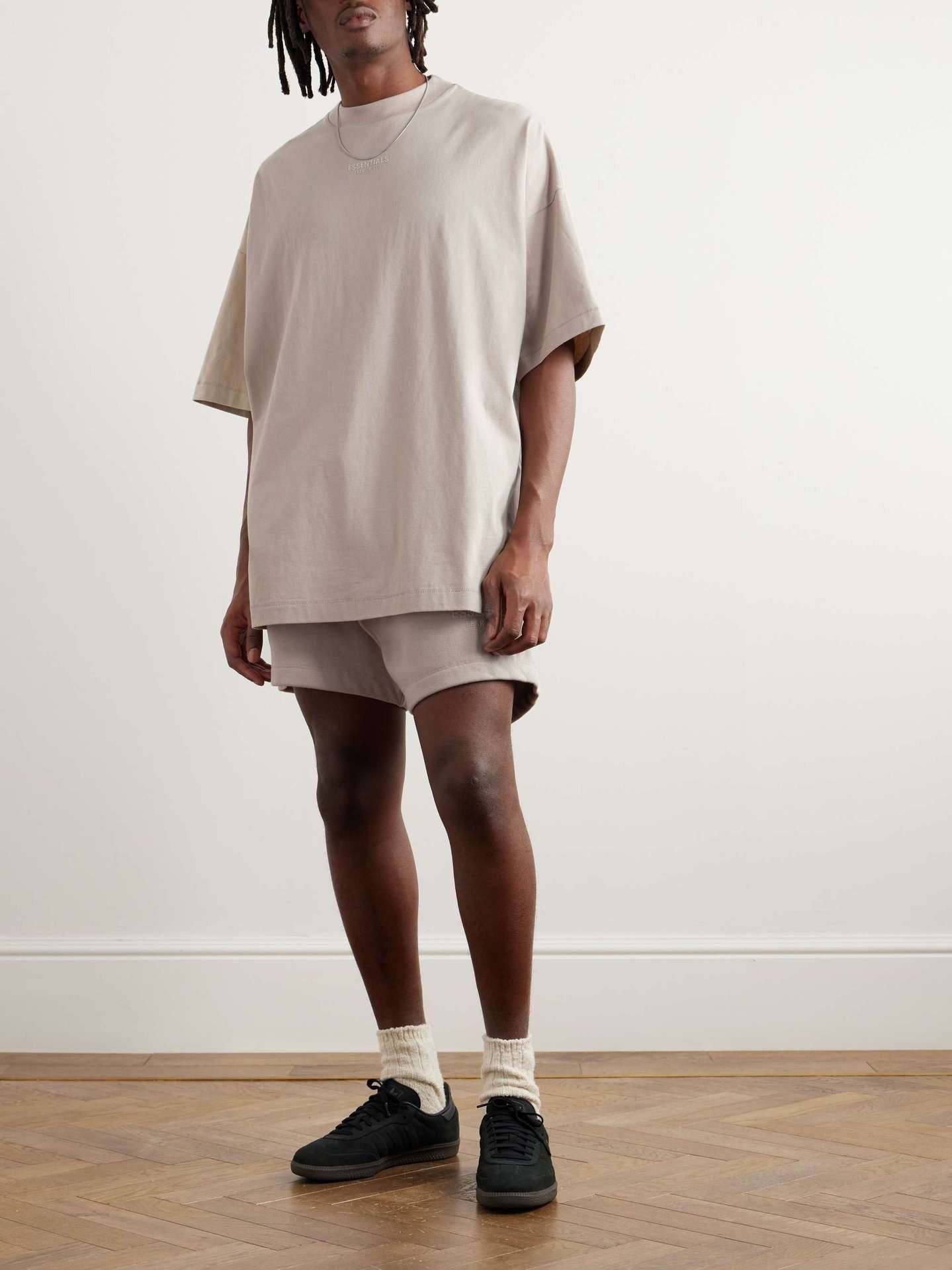 AMBERELLE Tonal Micro Logo Oversized T-Shirt in taupe
