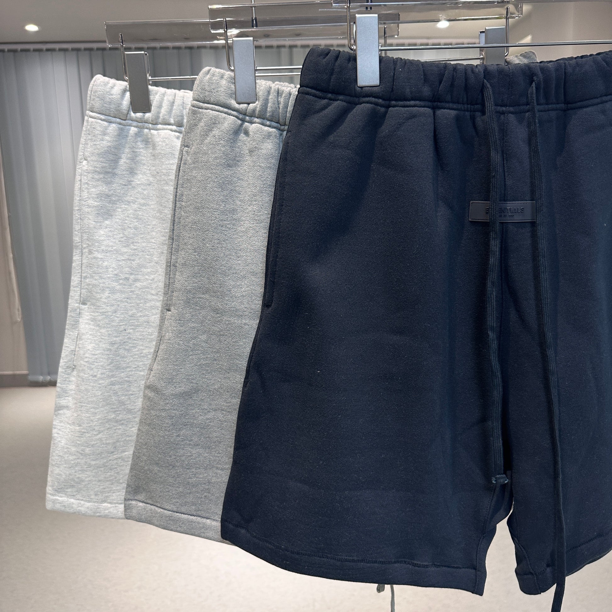 AMBERELLE Flocked Logo Fleece Sweatshorts in cream