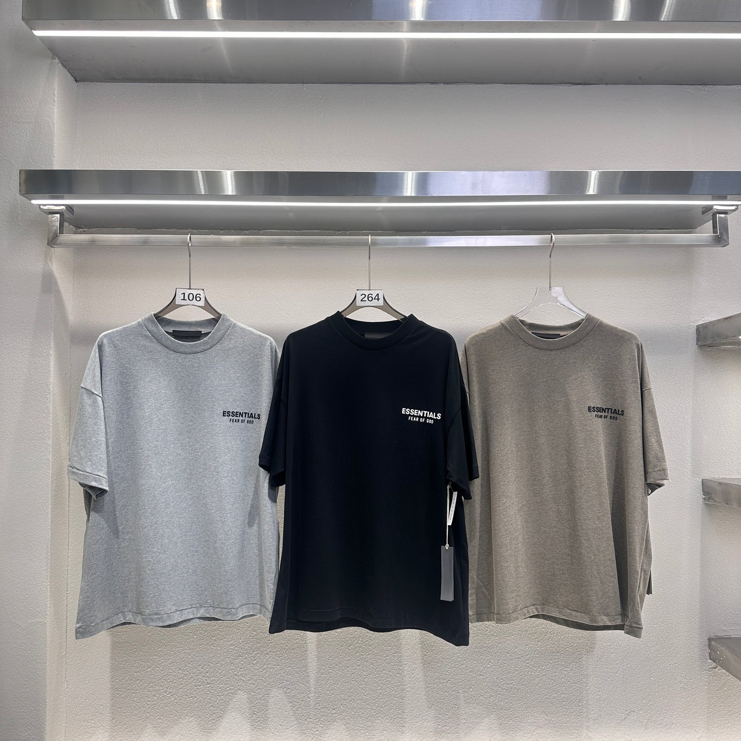 AMBERELLE Holiday Back Logo Short Sleeve Tee in beige