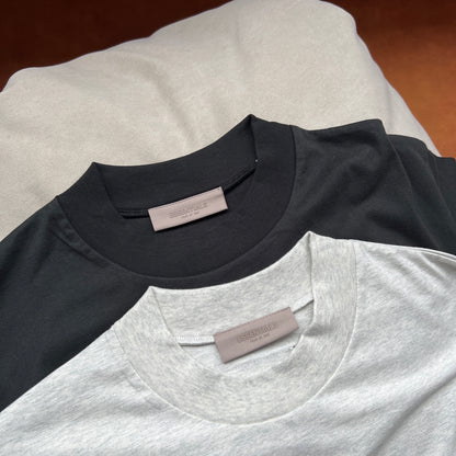 AMBERELLE Flocked Logo Oversized T-Shirt in black