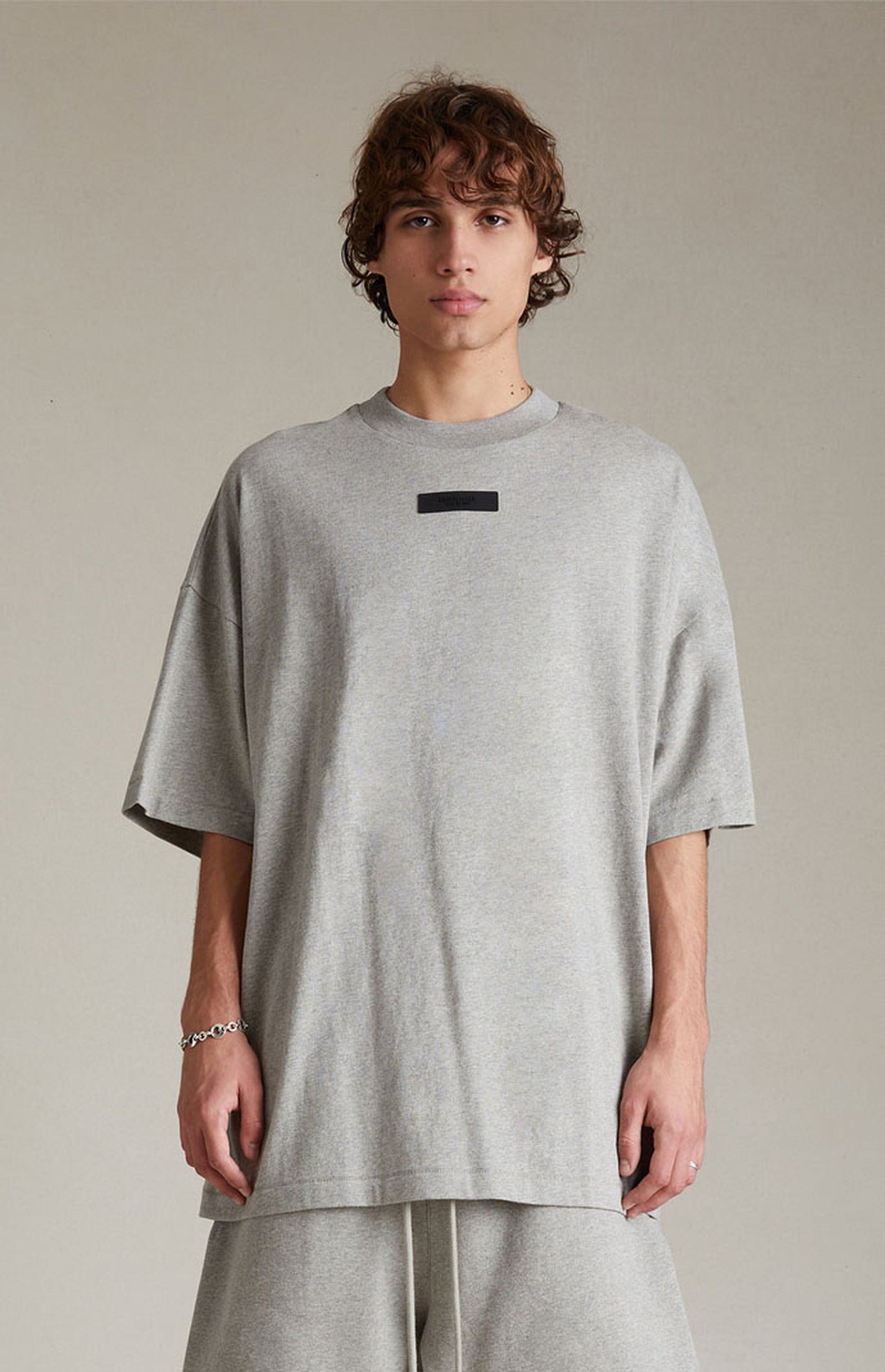 AMBERELLE Silicone Patch Short Sleeve Tee in black