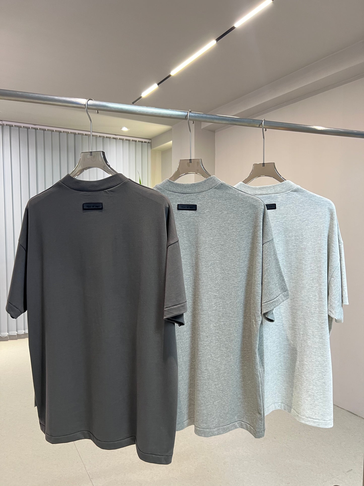 AMBERELLE Arc Logo Flocked Short Sleeve Tee in cream