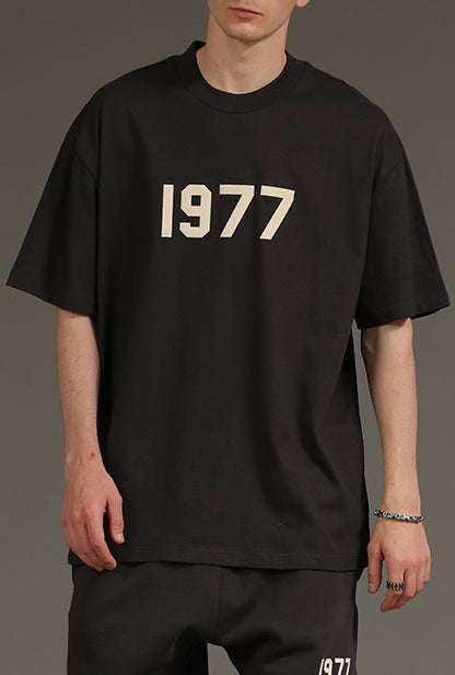 AMBERELLE 1977 Graphic Oversized Short Sleeve T-Shirt in black