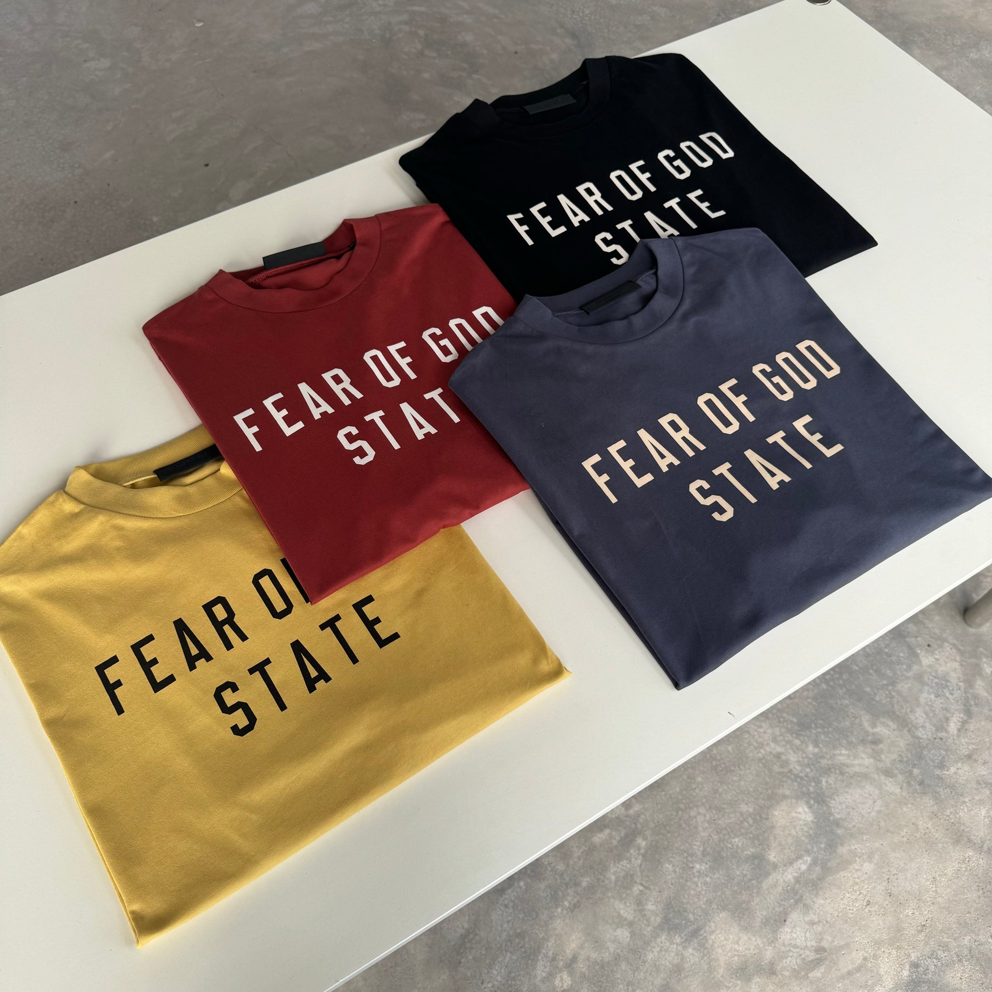 AMBERELLE State Letter Graphic Oversized T-Shirt in yellow