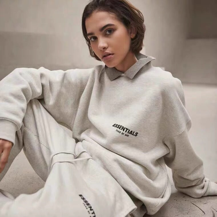 AMBERELLE Back Logo Long Sleeve Sweatshirt in cream