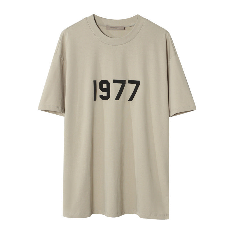 AMBERELLE 1977 Graphic Oversized Short Sleeve T-Shirt in beige