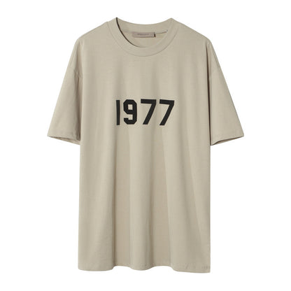 AMBERELLE 1977 Graphic Oversized Short Sleeve T-Shirt in beige