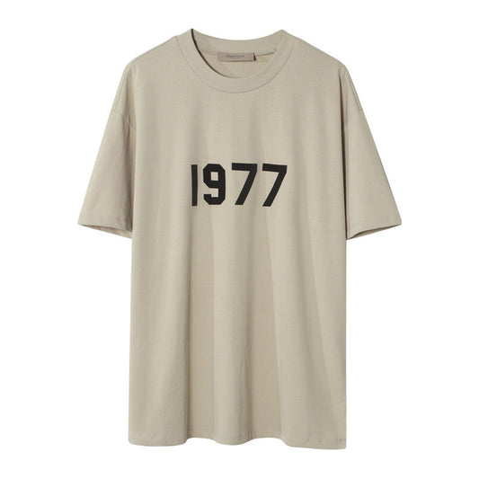 AMBERELLE 1977 Graphic Oversized Short Sleeve T-Shirt in beige