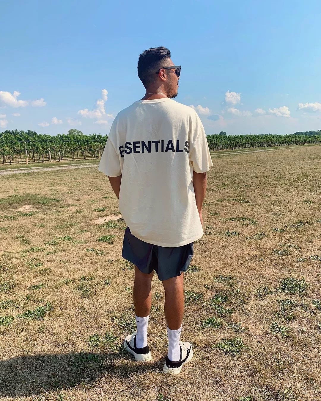 AMBERELLE Reflective Back Logo Oversized T-Shirt in black