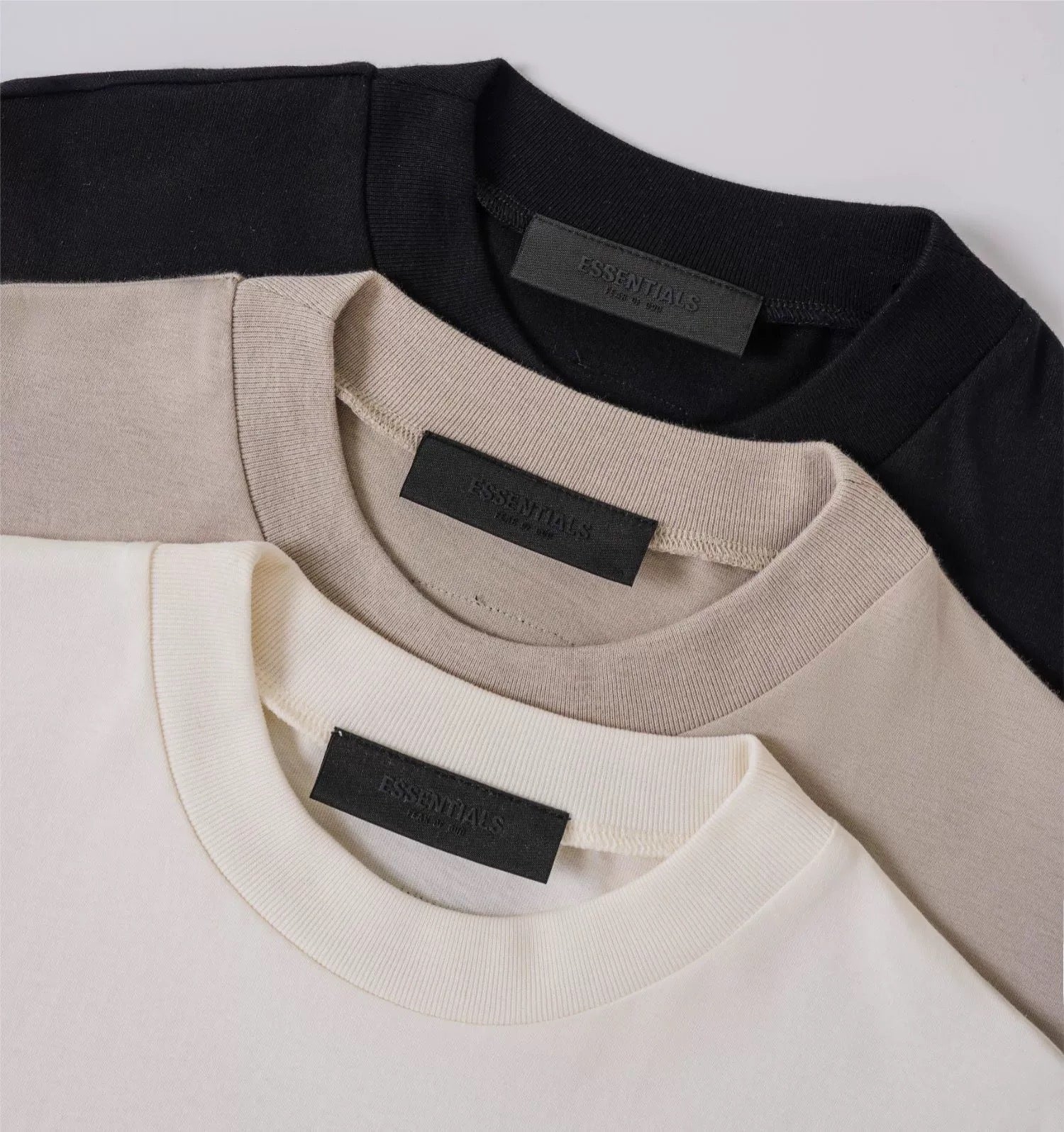 AMBERELLE Tonal Micro Logo Oversized T-Shirt in cream