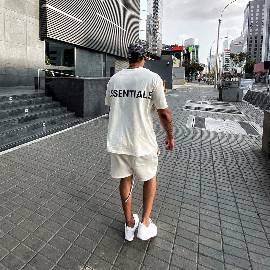 AMBERELLE Reflective Back Logo Oversized T-Shirt in black