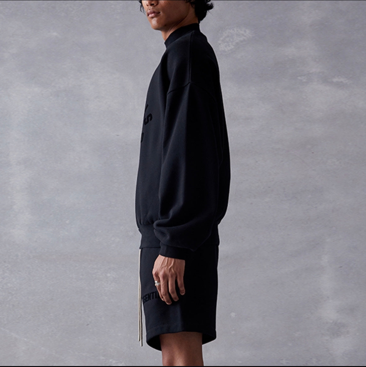 AMBERELLE Arc Logo Flocked Mock Neck Sweatshirt in black