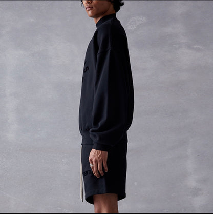 AMBERELLE Arc Logo Flocked Mock Neck Sweatshirt in black