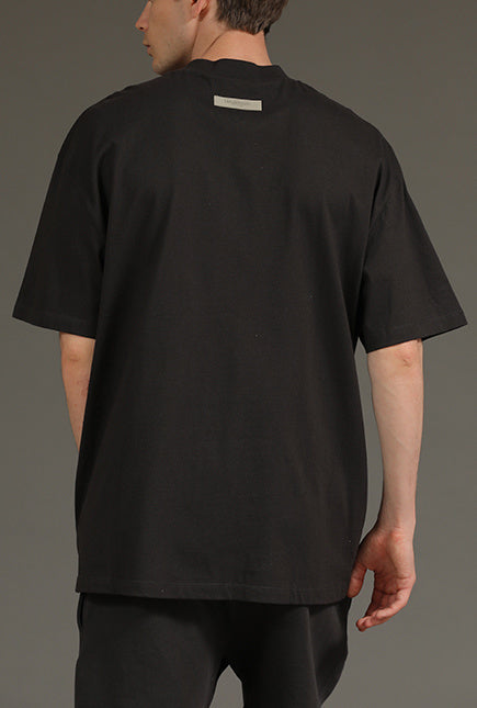 AMBERELLE 1977 Graphic Oversized Short Sleeve T-Shirt in black