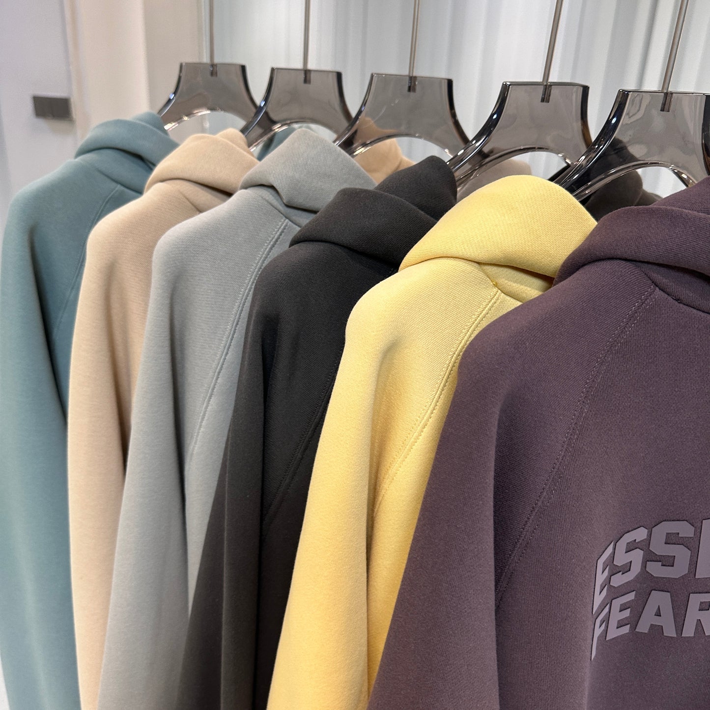 AMBERELLE Season 9 Tonal Logo Fleece Hoodie in blue