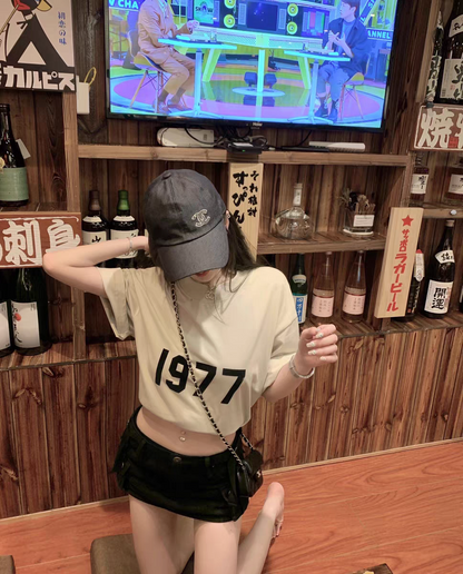 AMBERELLE 1977 Graphic Oversized Short Sleeve T-Shirt in black
