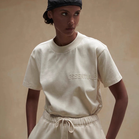 AMBERELLE Tonal Flocked Logo Short Sleeve Tee in cream