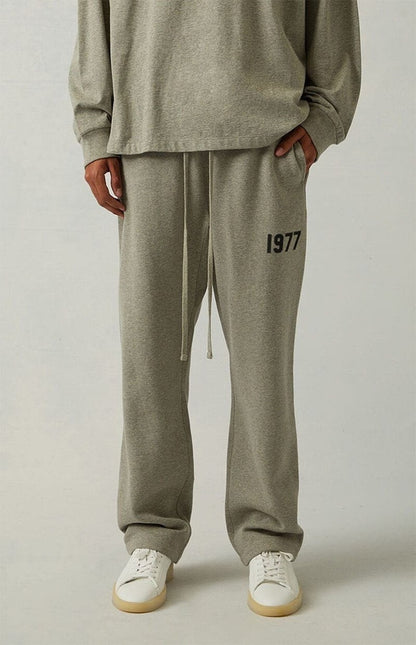 AMBERELLE 1977 Relaxed Wide-Leg Sweatpants in light heather grey