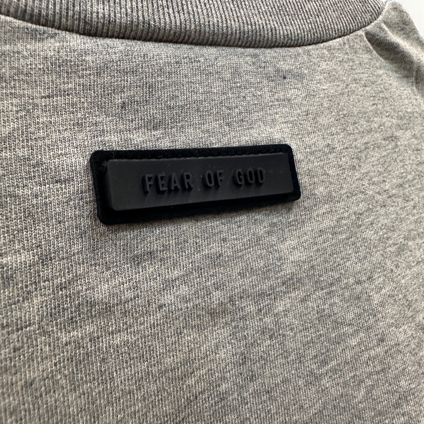 AMBERELLE Arc Logo Flocked Short Sleeve Tee in black