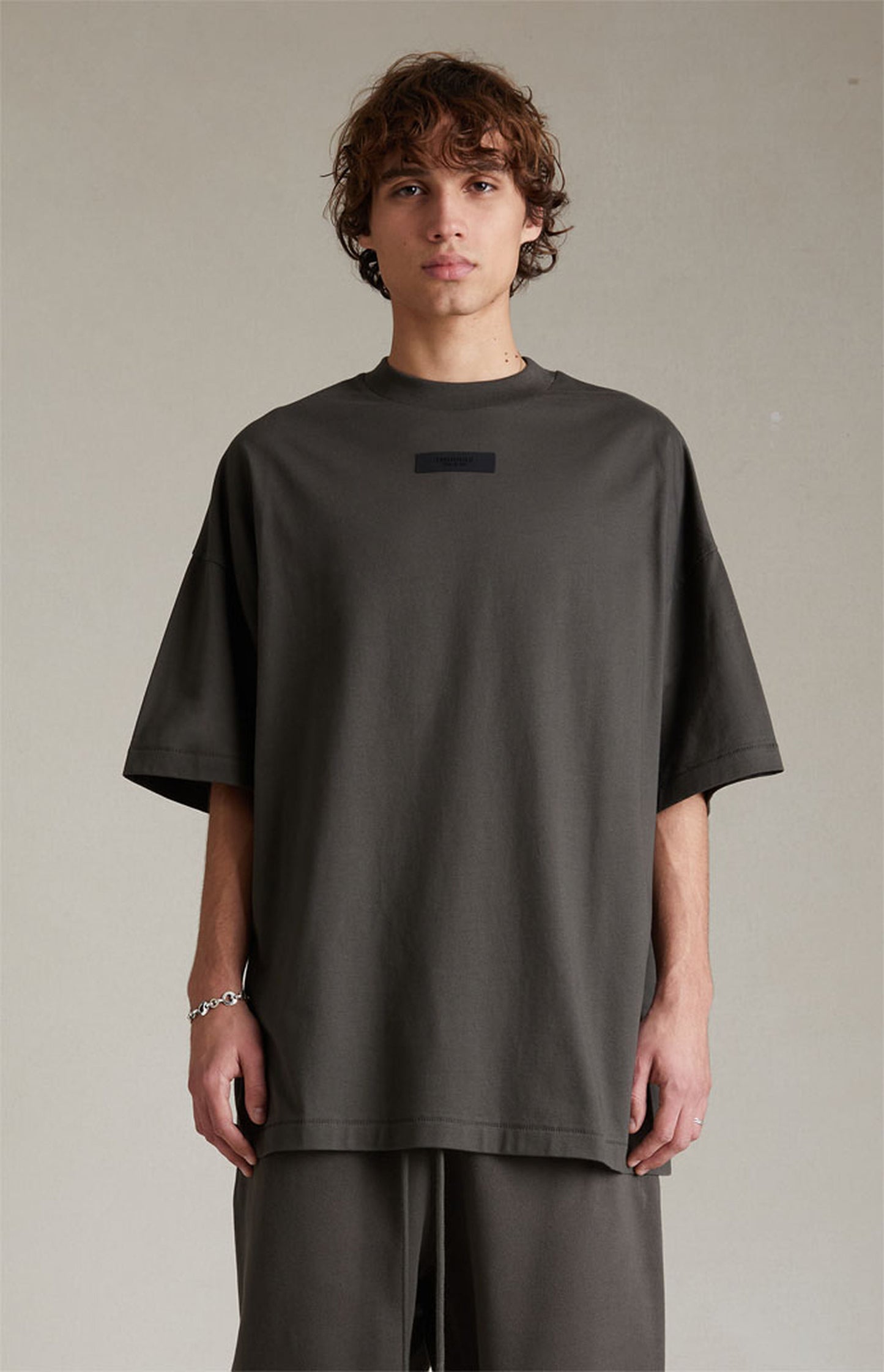 AMBERELLE Silicone Patch Short Sleeve Tee in black