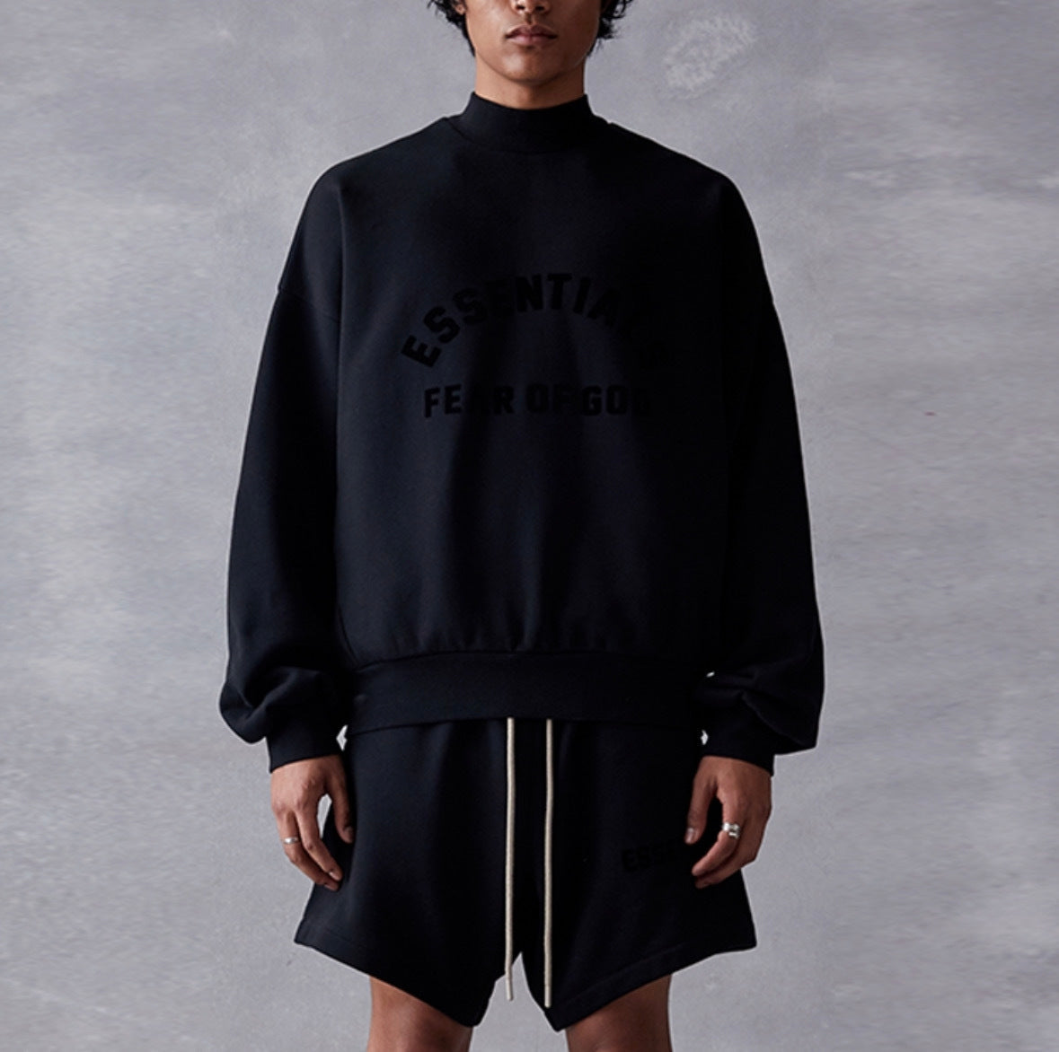 AMBERELLE Arc Logo Flocked Mock Neck Sweatshirt in black