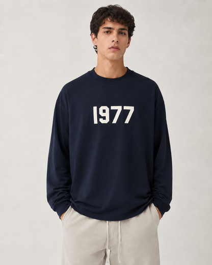 AMBERELLE 1977 Graphic Long Sleeve Tee in light heather grey