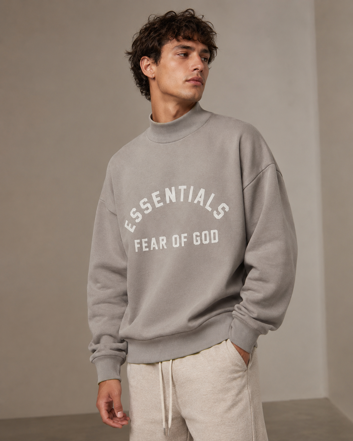 AMBERELLE Arc Logo Flocked Mock Neck Sweatshirt in light heather grey