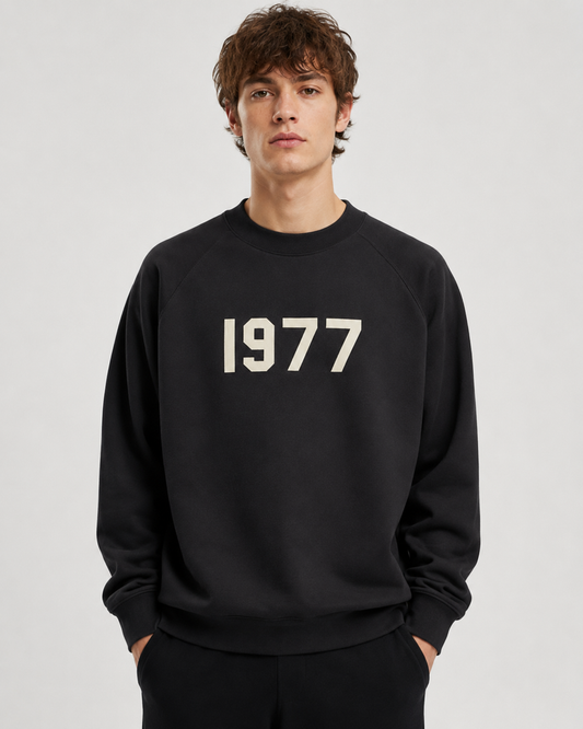 AMBERELLE 1977 Graphic Crewneck Sweatshirt in black