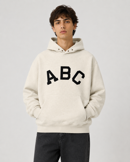 AMBERELLE Varsity Letter Graphic Hoodie in cream