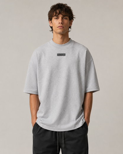 AMBERELLE Mock Neck Rubber Label Oversized T-Shirt in taupe