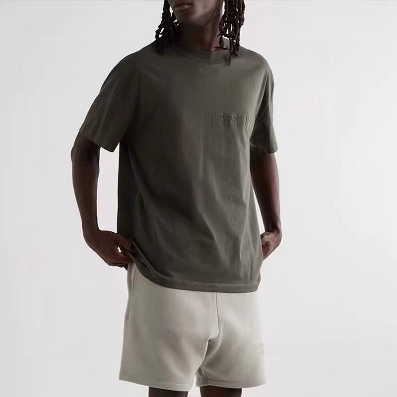 AMBERELLE Tonal Flocked Logo Short Sleeve Tee in light heather grey