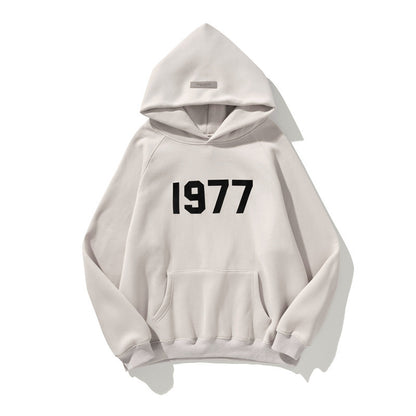 AMBERELLE 1977 Graphic Fleece Hoodie in beige