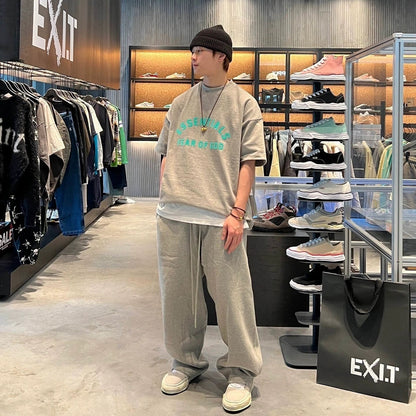 AMBERELLE Arc Logo Oversized T-Shirt in black