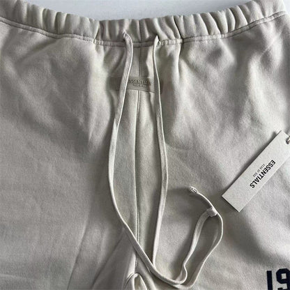 AMBERELLE 1977 Relaxed Drawstring Sweatshorts in light heather grey