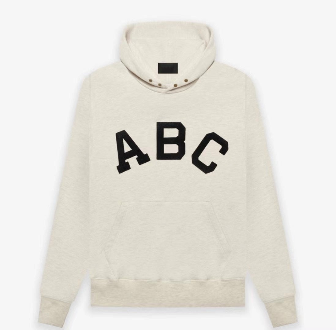 AMBERELLE Varsity Letter Graphic Hoodie in cream