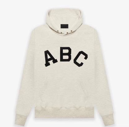 AMBERELLE Varsity Letter Graphic Hoodie in cream
