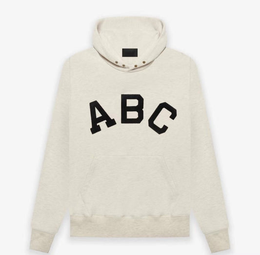 AMBERELLE Varsity Letter Graphic Hoodie in cream