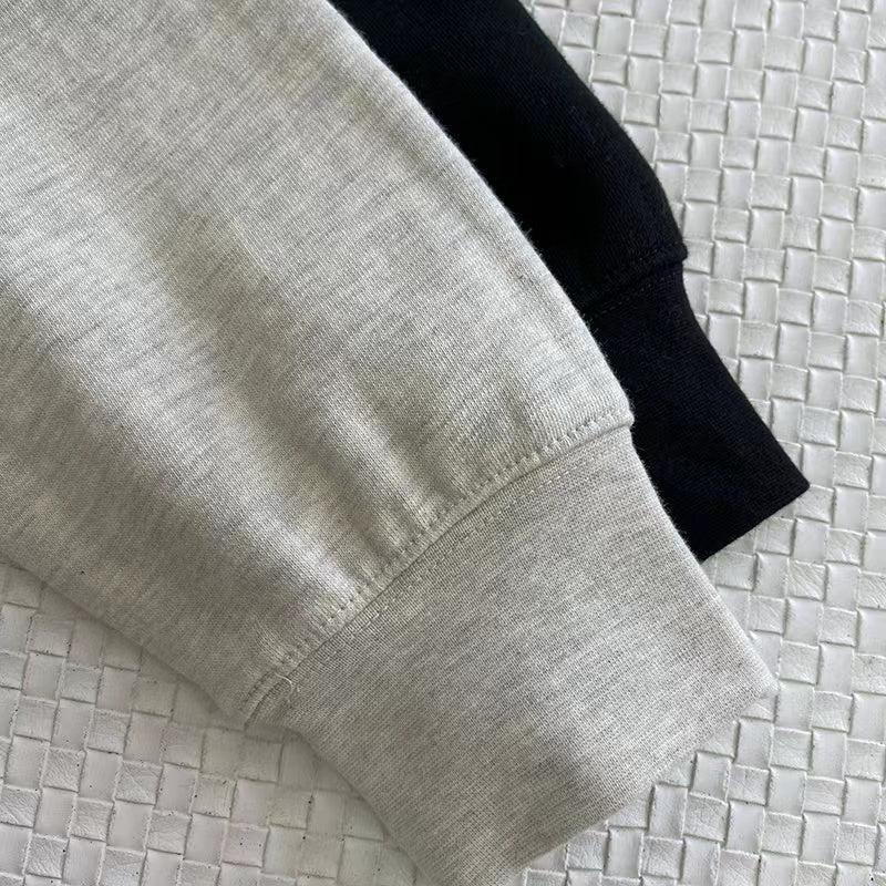 AMBERELLE 1977 Graphic Fleece Hoodie in black