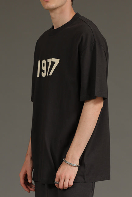 AMBERELLE 1977 Graphic Oversized Short Sleeve T-Shirt in black