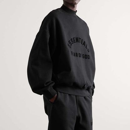 AMBERELLE Arc Logo Flocked Mock Neck Sweatshirt in black
