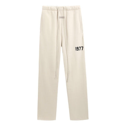 AMBERELLE 1977 Relaxed Wide-Leg Sweatpants in light heather grey