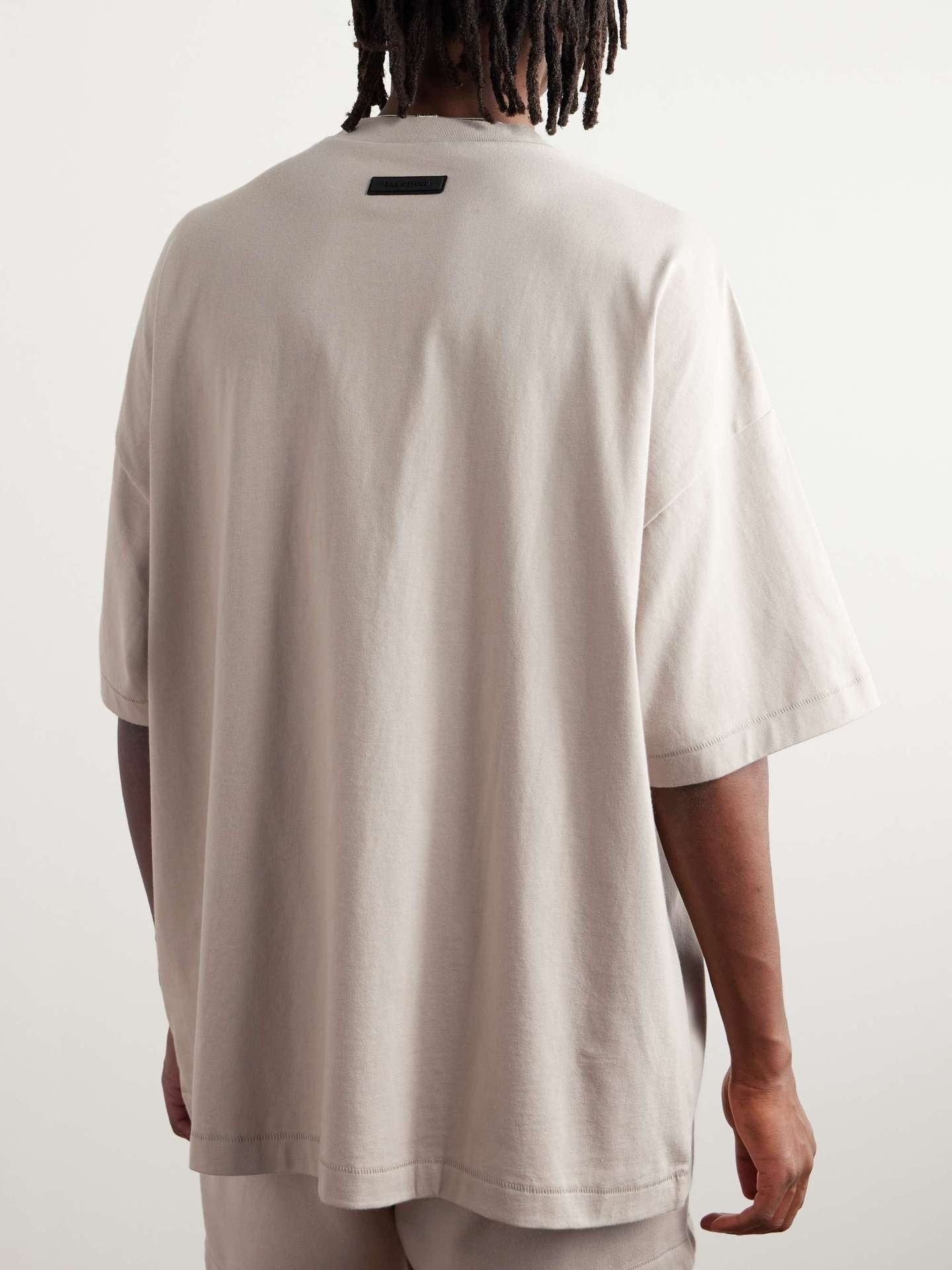 AMBERELLE Tonal Micro Logo Oversized T-Shirt in taupe