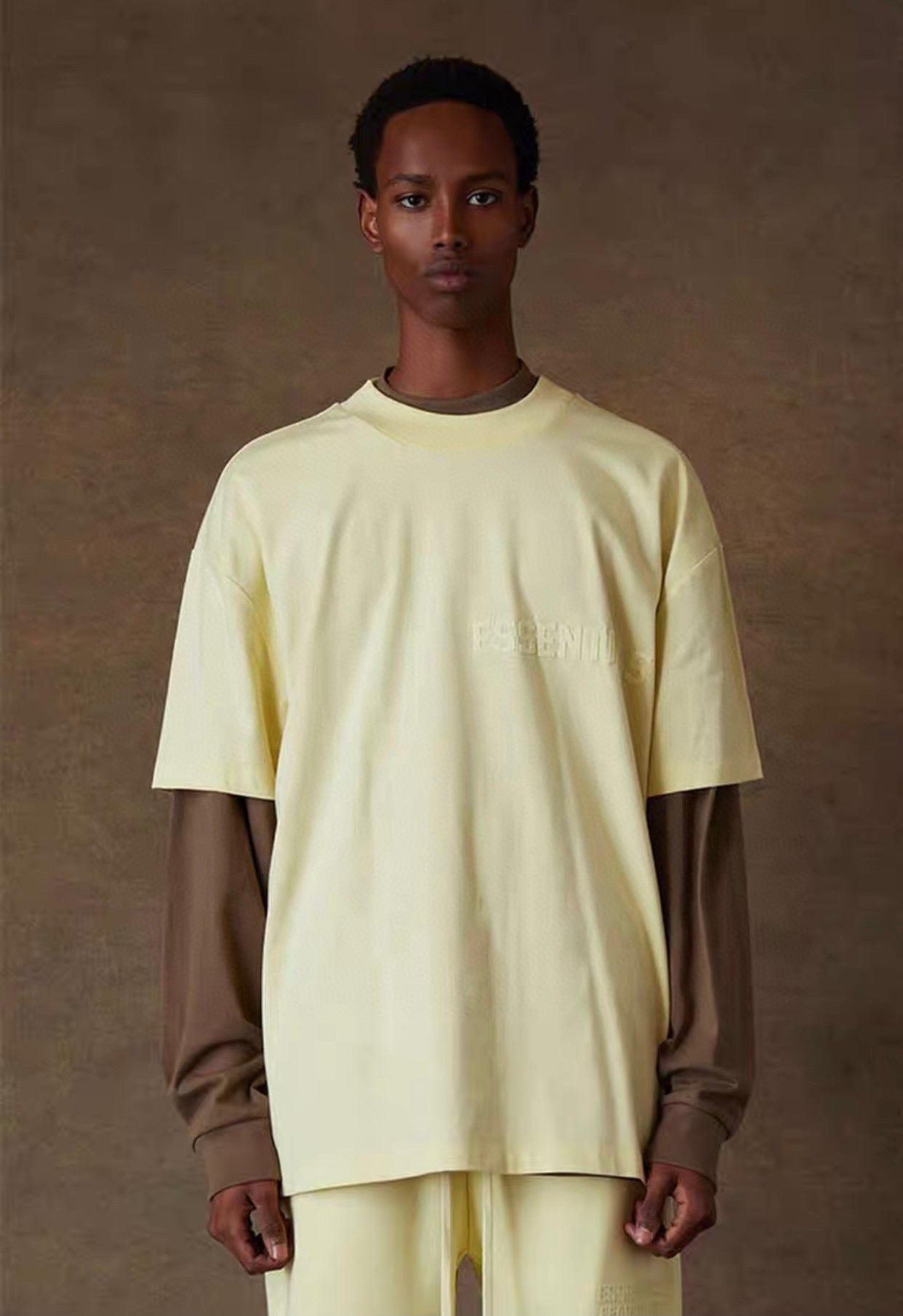 AMBERELLE Tonal Flocked Logo Short Sleeve Tee in light heather grey