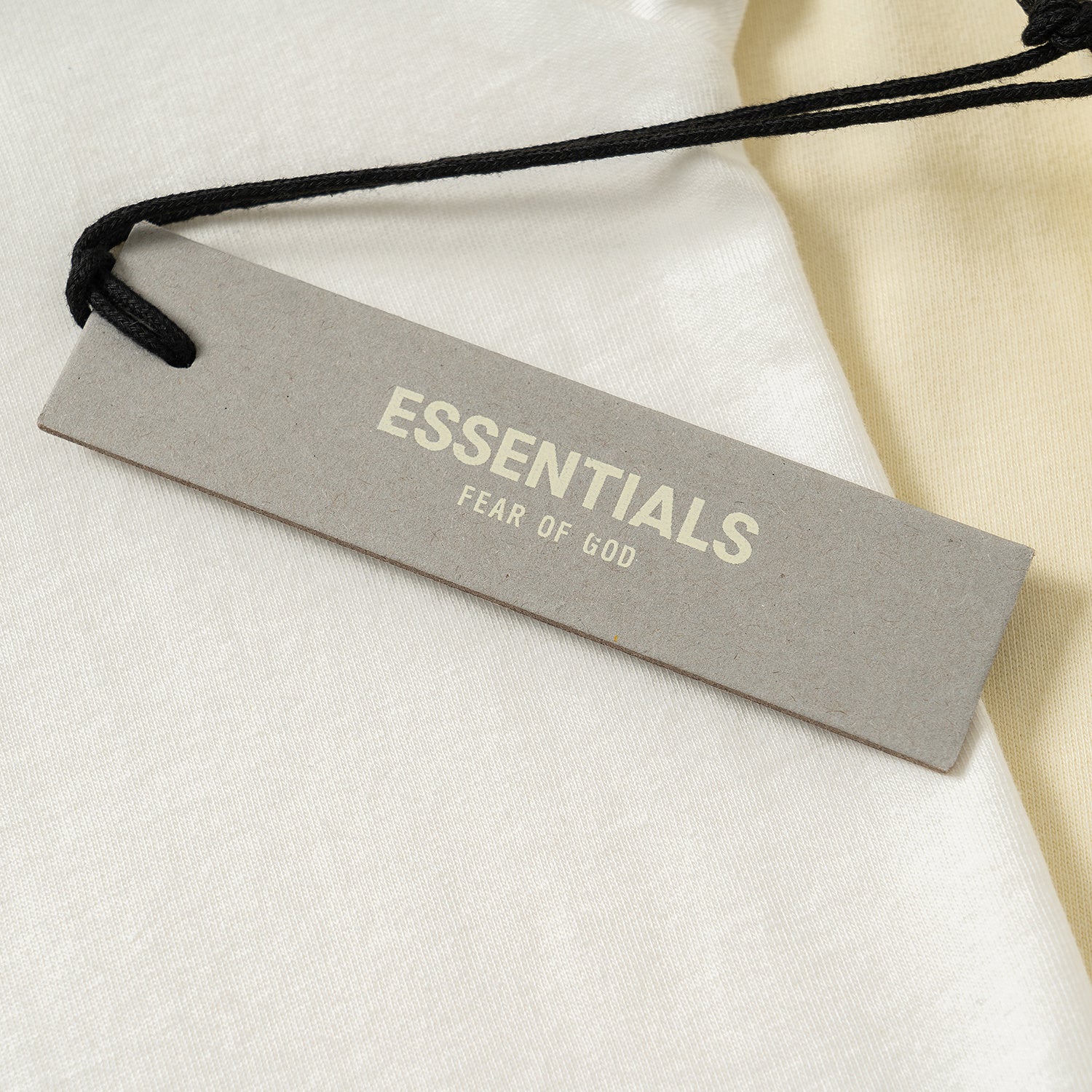 AMBERELLE Core Silicone Label Oversized T-Shirt in cream